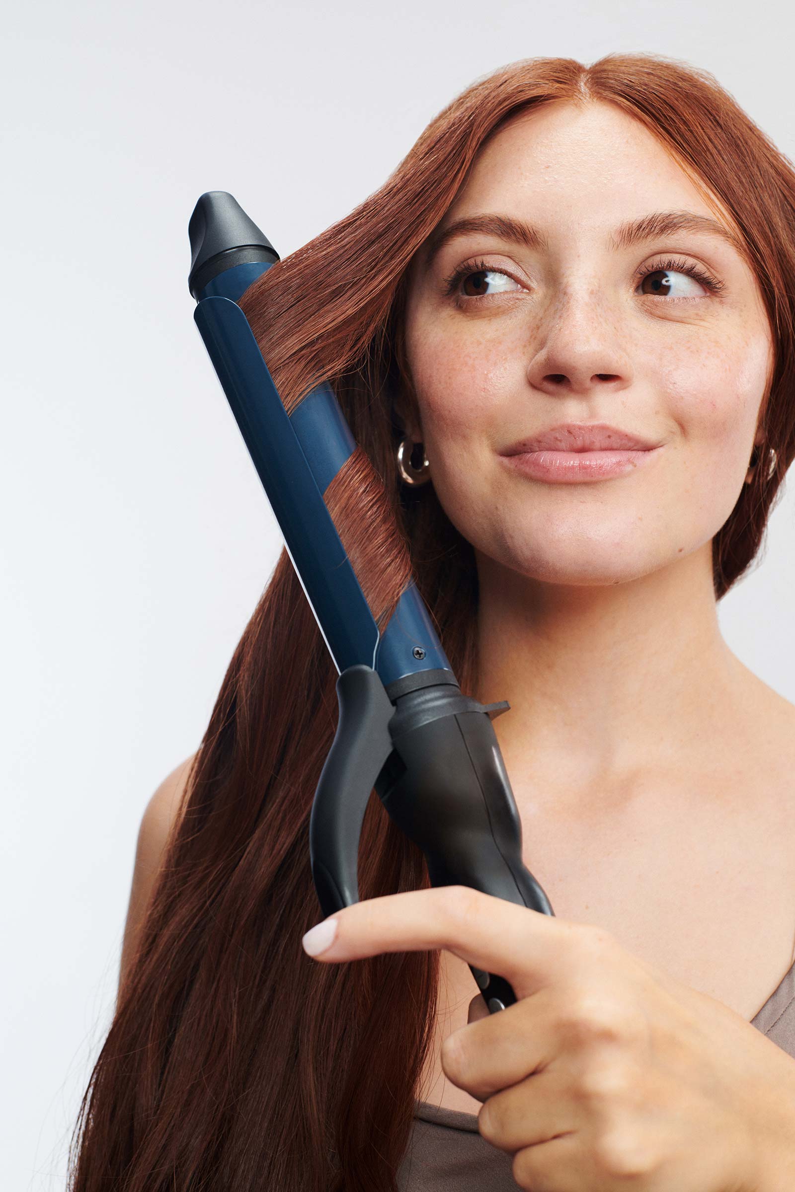 Curling iron with shop long barrel
